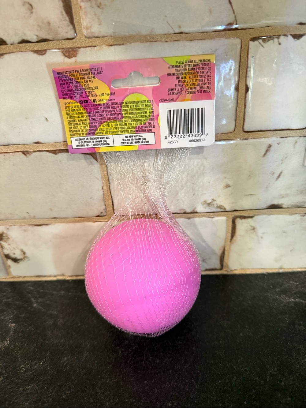Orb Curiosities Funny Face Balls Pink Squeeze Toy - Picture 2 of 3